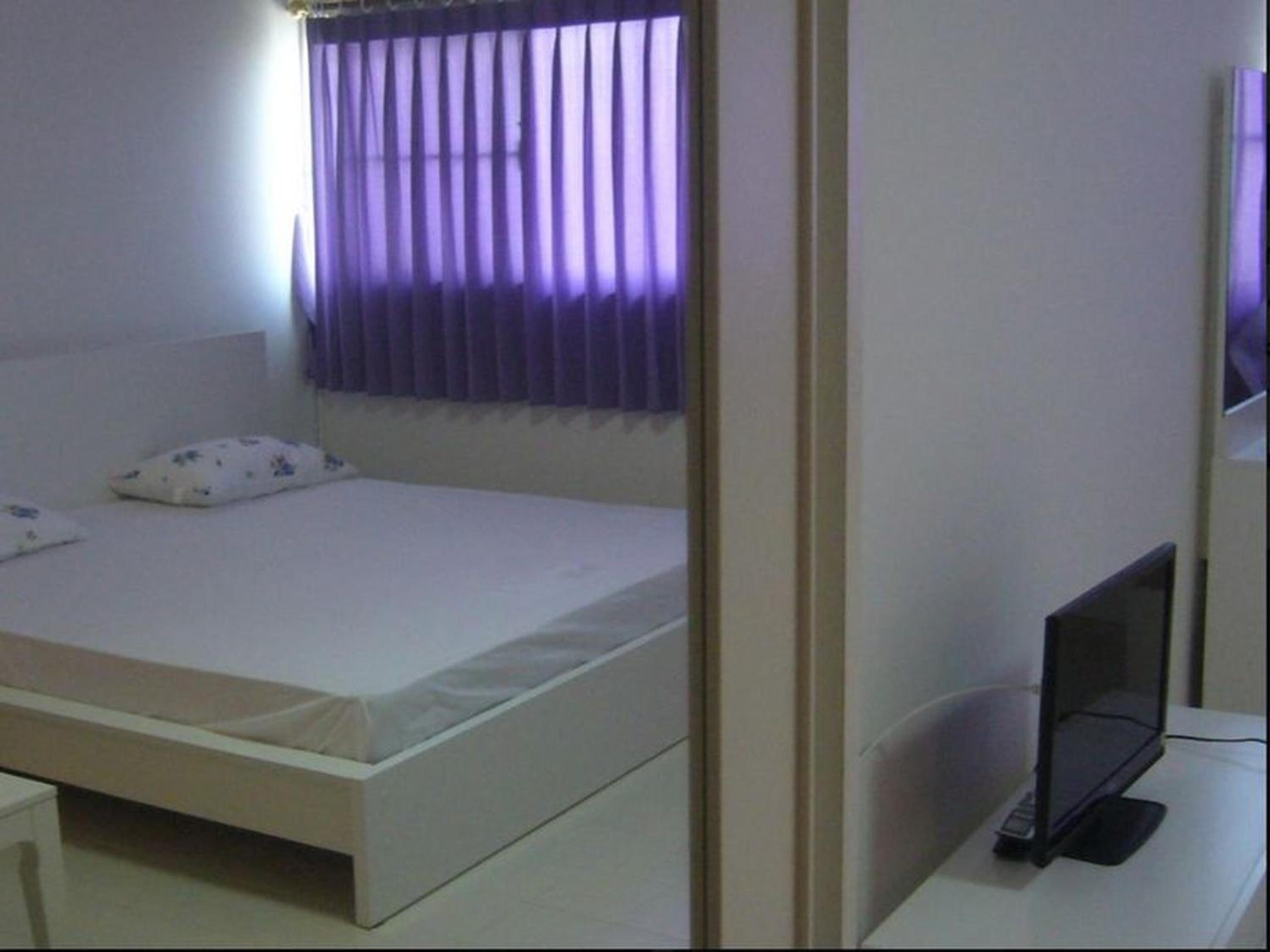 Foto de T8 Guest House Don Mueang Challenger triple room