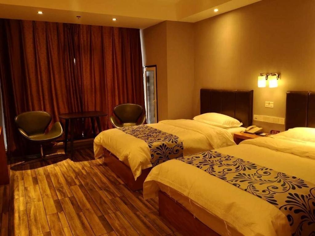 Foto de Super 8 Hotel Changchun Jingyue Xincheng Street Bashu Yingxiang