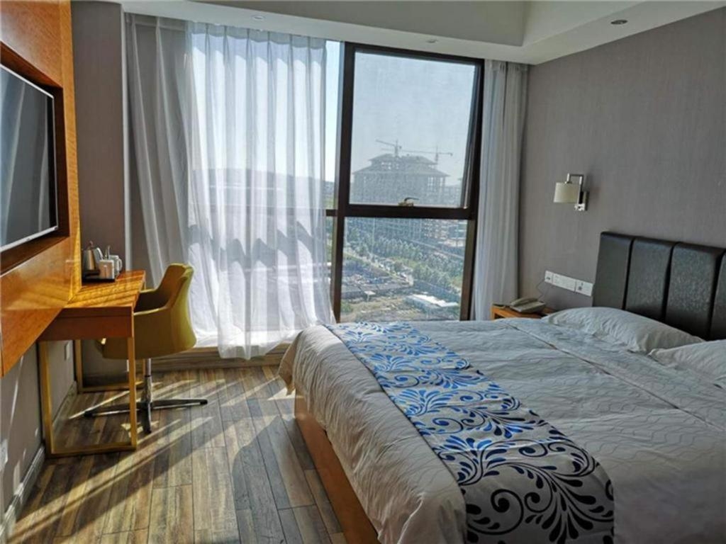 Foto de Super 8 Hotel Changchun Jingyue Xincheng Street Bashu Yingxiang